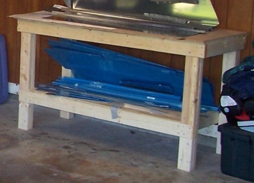 The standard EAA Chapter 1000 worktable with modified top...plans available on the internet...