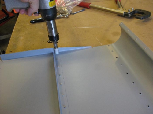 Backriveting the middle stiffener
