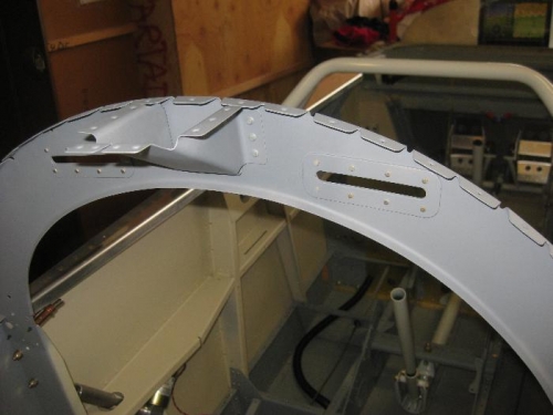 Harness fairleads and canopy rail receptacle on F-807 bulkhead