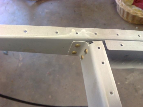 Counterbalance substructure riveted to spar
