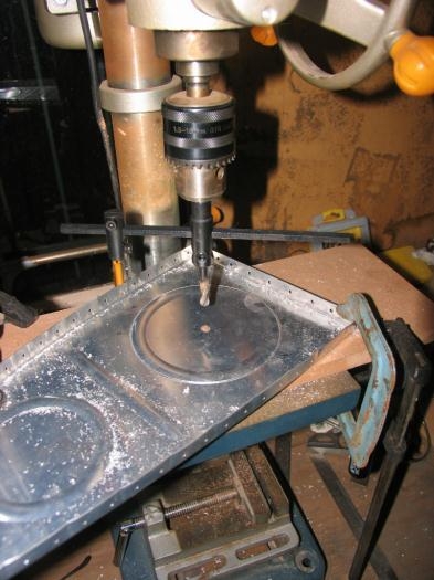 Using a fly-cutter to cut out the inspection hole