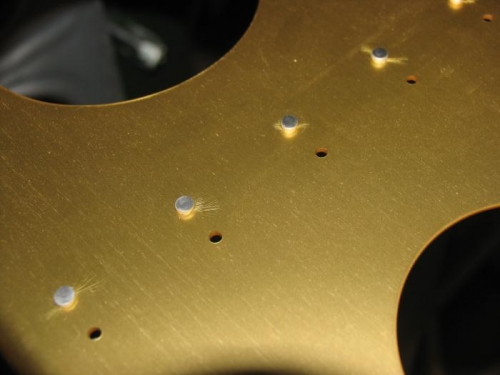 Front spar rivetting - spider web like marks in anodising visible