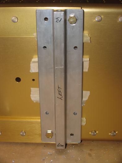 Spaces taped into position with bracket bolted on - holes match drilled.