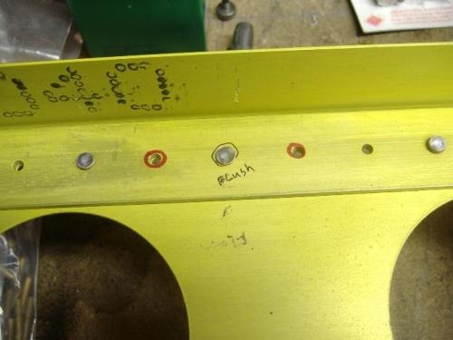 This one gets replaced with a flush rivet