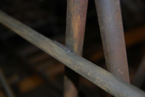 Saddle added just behind pilot seat.