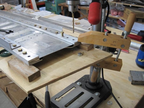Spar clamped to jig for drilling/reaming