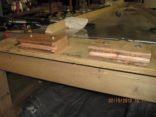Jig to hold practice bar for riveting
