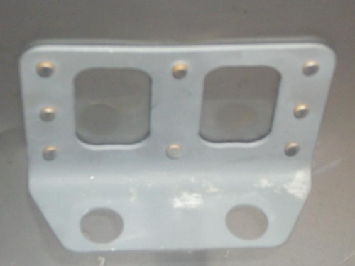 The brake tubing bracket riveted to inside firewall.