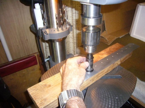 Countersinking the plate on the drill press.