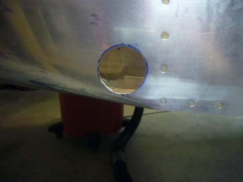 Hole in fuselage for the step.