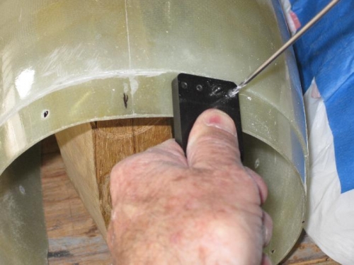 Drilling the nutplate rivet holes.