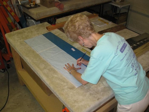 Charlotte tracing rear skirt to make a posterboard pattern,
