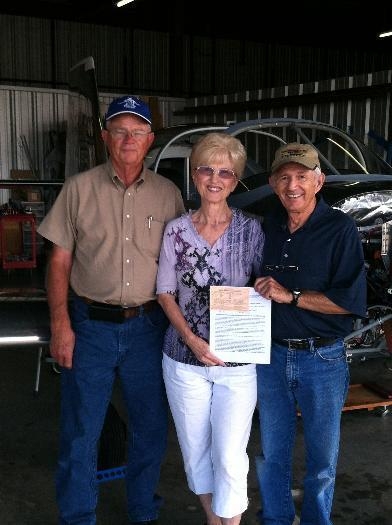Left-to-right, DAR, Charlotte & Ken with the Airworthiness Certificate
