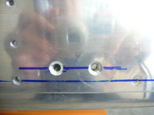 Countersunk holes for the mount tube support.