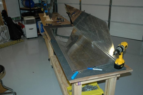 Working on deburring the skins.