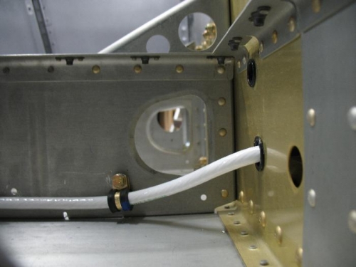 This is shot from the outside, towards the direction of the push rod attachment to the control column