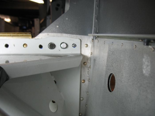 Upper bolt holes with pins installed