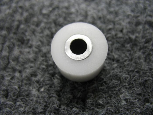 Bushing from plans surrounded by nylon bushing made from Delrin rod
