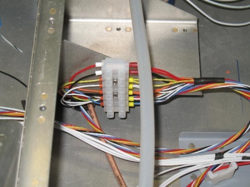 Right side in photo has two servo wires together, opposite side is the run to the AP-74