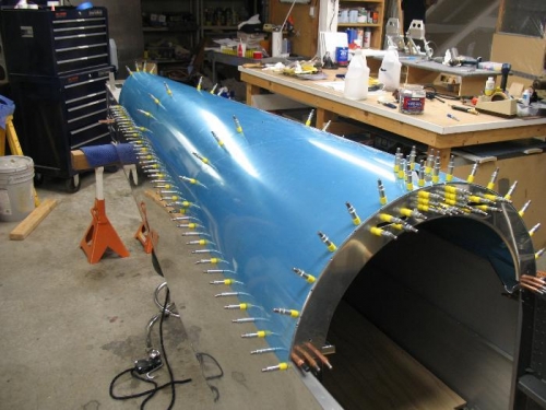 Aft skin clecoed on, fuselage on lower stand