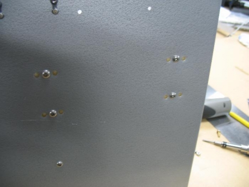 Low profile screws holding trim module