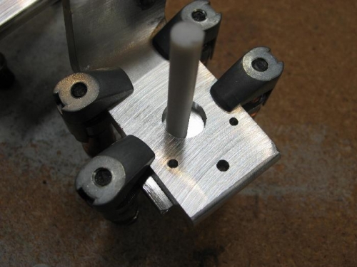 Teflon rod in bottom hole.