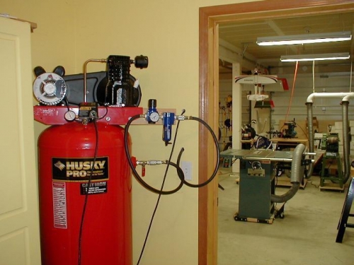 Air goes through the wall into the shop.