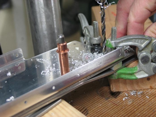 Drill spacer to #12.