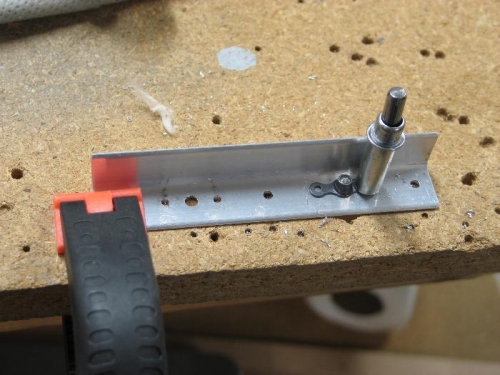 Drill platenut attach holes.