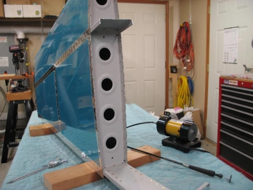 Trim vertical Fin forward spar.