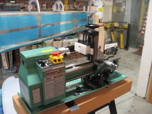 Lathe with mil/drill attachment.