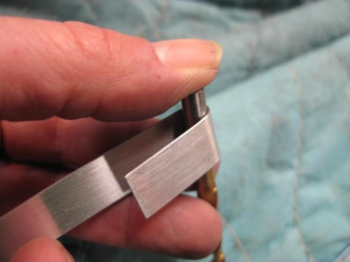 Bend 180 drgress around drill.