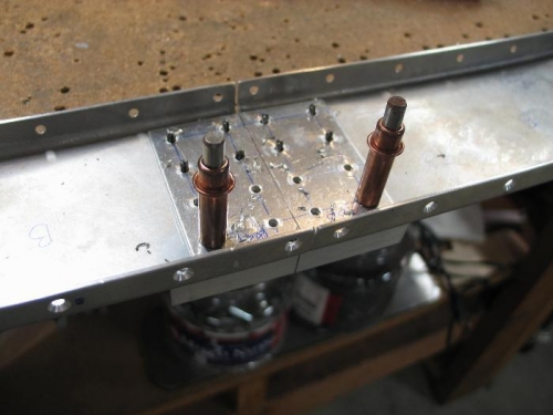 Splice plate not vertically symmetrical .
