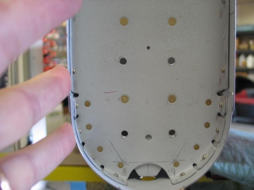 Tie down bracket riveted on.