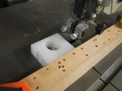 Split with band saw.