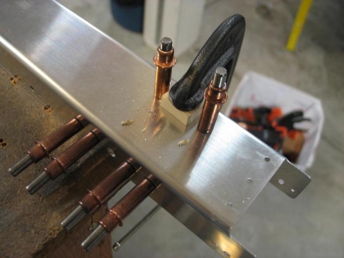 Drill angle through channel.
