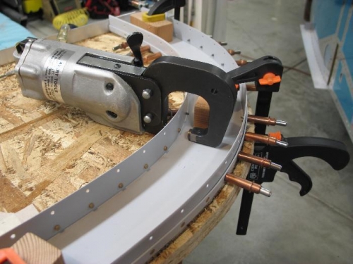 Squeeze inner rivets.