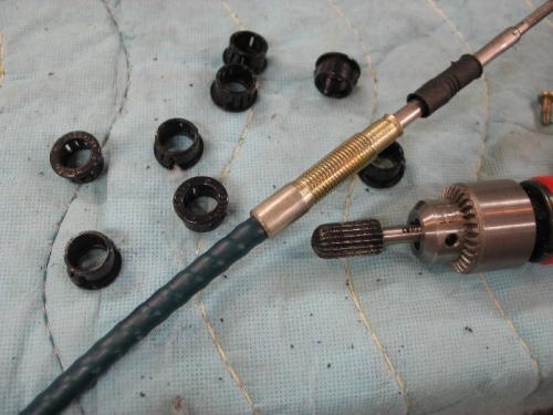 Expand cable snap bushings.
