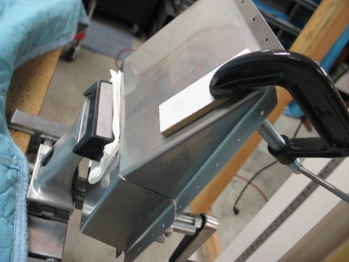 Remove dent by clamping on each side.