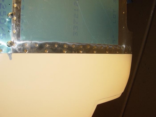 Bottom forward edge installed w/ screws