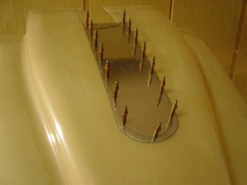 Fabricating nose gear leg slot cover