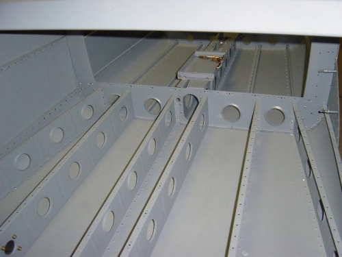 Riveting the ribs to the bulkhead was a 'stretch' for a fat ol'man