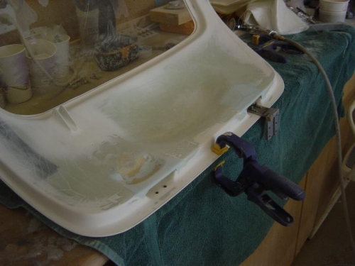 Co-pilot door hinge covers filled/sanded