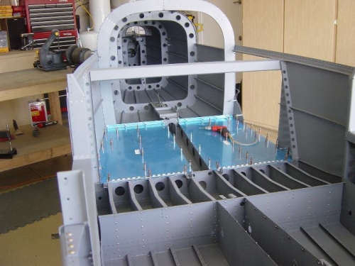 Both baggage area floors clecoed and drilled