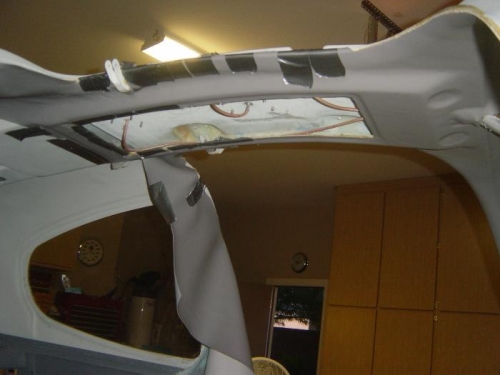 Forward portion of overhead console covered.