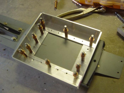 Battery box angles drilled prior to csk and riveting.