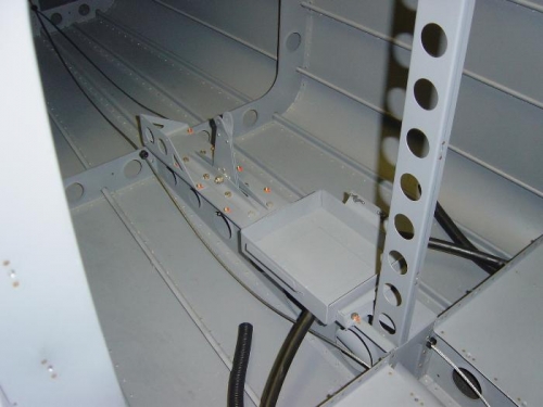 Reinstalled in the ribs w/ Control pushrod connected.