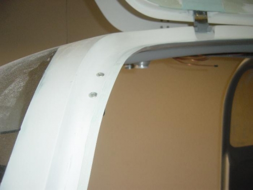 Most of the curved portion of the door frame removed