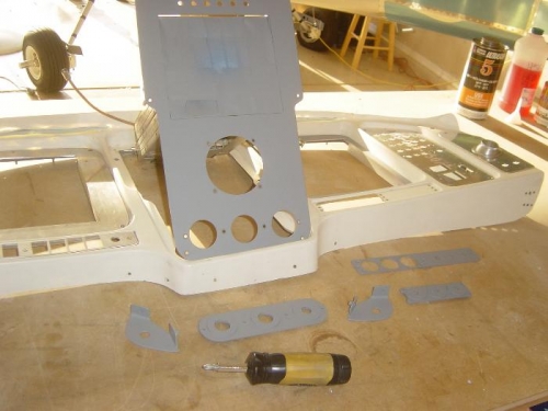 Several of the sub-panels sanded/filled and primed for paint