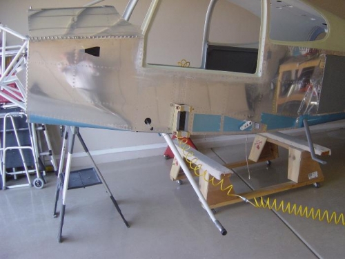 Fuse raised on extendable sawhorses to get clearance for inserting gear leg